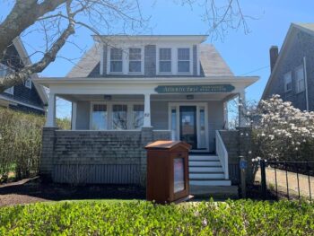 The Atlantic East Nantucket Real Estate Office, A 1.5 story cedar shingle building with front porch. 